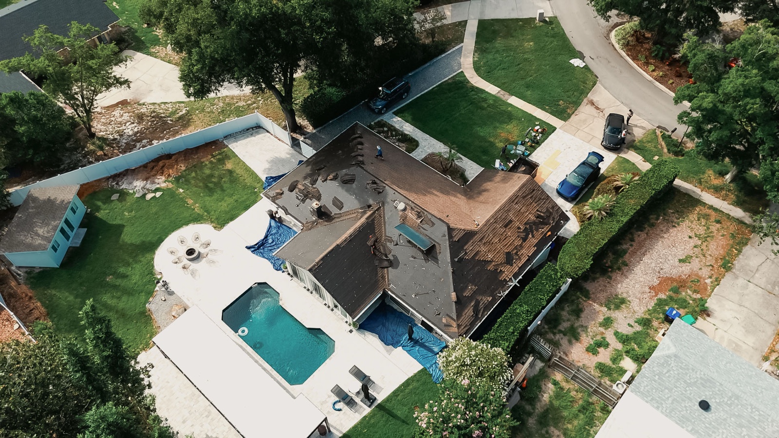 Aerial of aging shingle roof before replacement in Orlando, FL